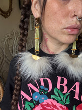 Green dyed denatelium fox