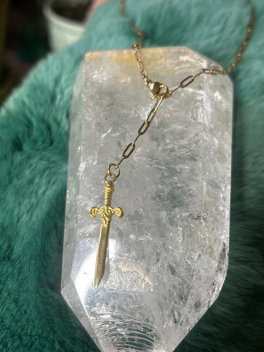 Gold paperclip dagger adjustable